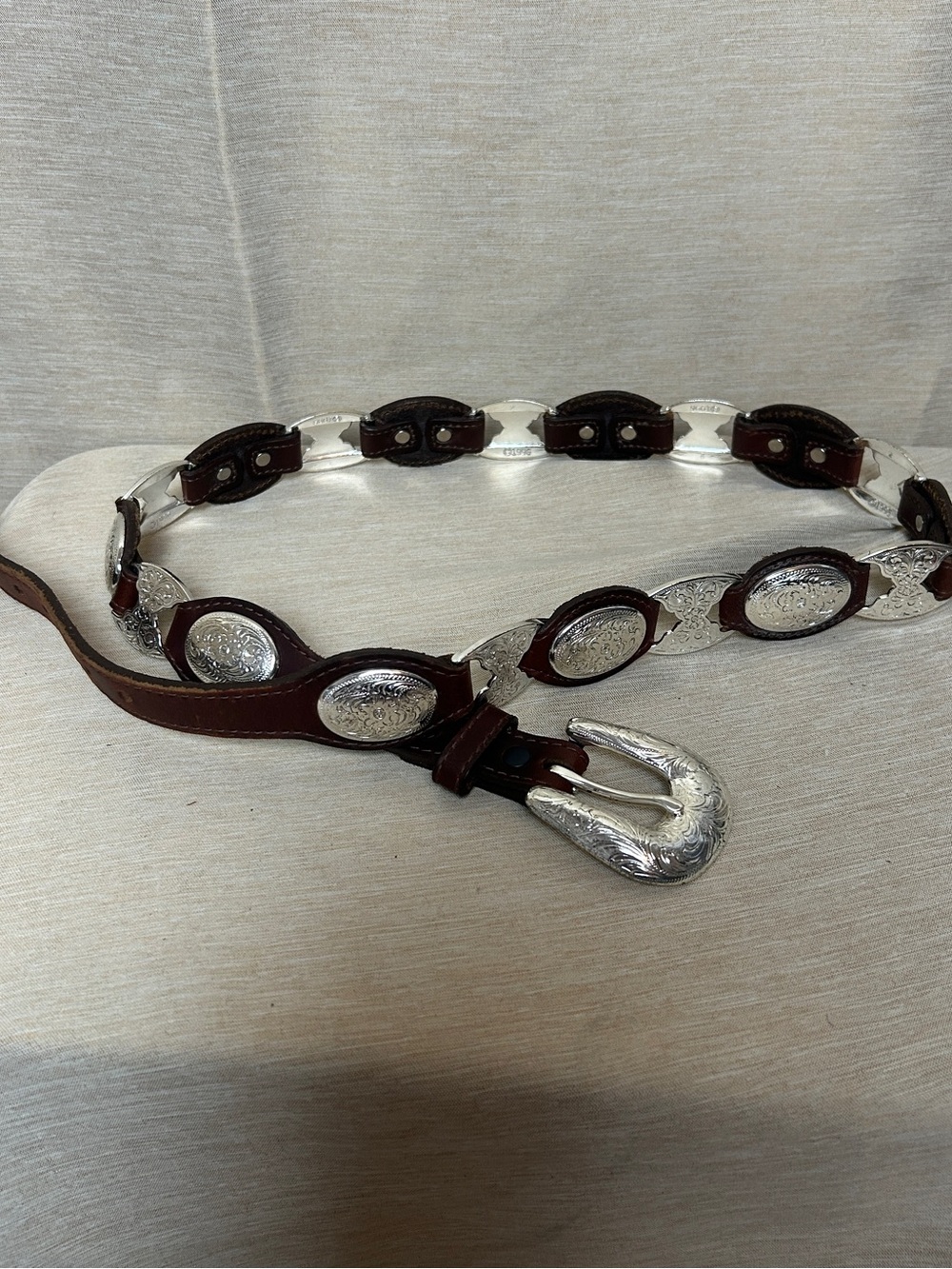 Tony Lama Vintage Dark Brown Leather Belt with Silver Engraved Conchos.
